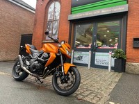 2010 Kawasaki Z750 naked motorcycle in orange 