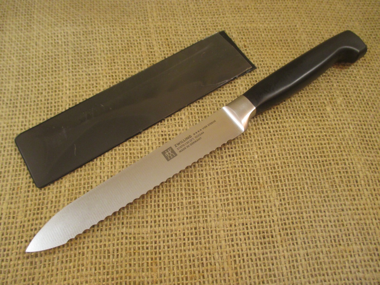 Zwilling J.A. Henckels Four Star 5 inch Serrated Utility Knife