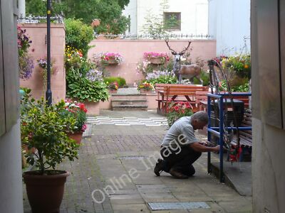 Photo 12x8 Dingwall Museum Courtyard Dingwall/NH5458 Flowers, a model sta c2011
