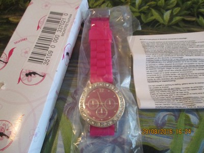 Montre rose et strass neuve et pile 3 Suisses
