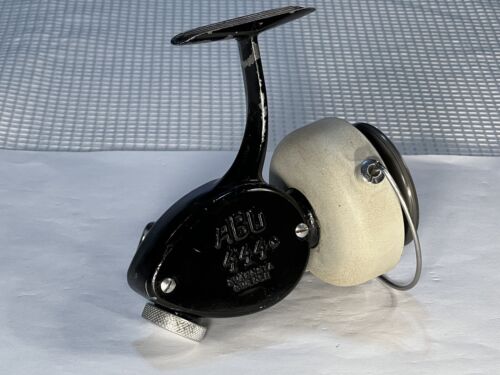 ABU 444 Vintage Spinning Reel Black Satin & Off-White Bezel ABU 444 Vintage Spinning Reel Black Satin & Off-White Bezel