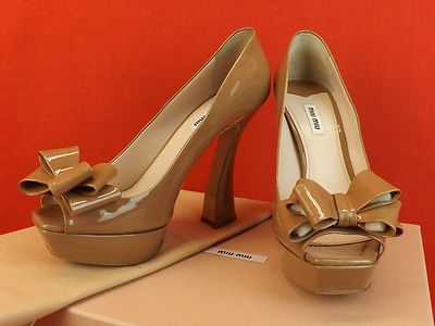 Pre-owned Prada Miu Miu  Caramel Patent Leather Bow Flared Heel Platform Pumps 41 In Nude/caramel