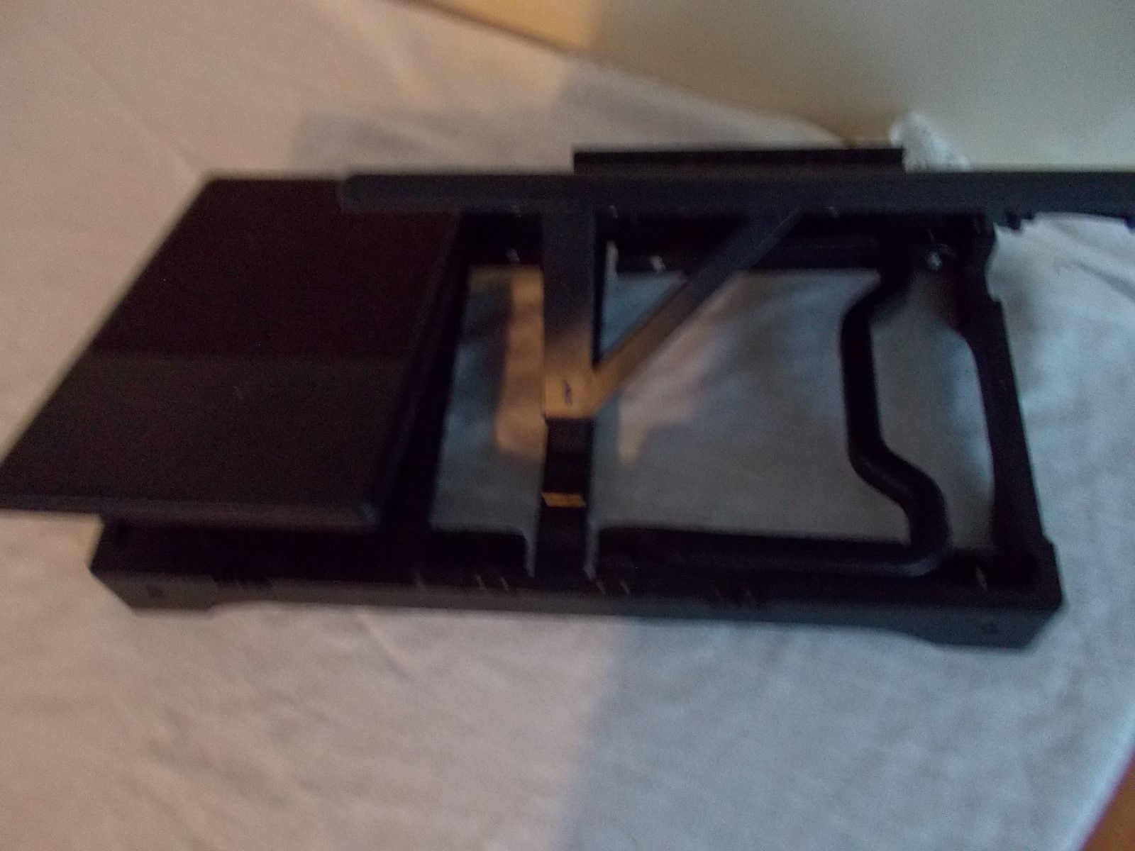 PORTABLE LAPTOP AND MOUSE HOLDER EACH SECTION IS ADJUSTABLE.