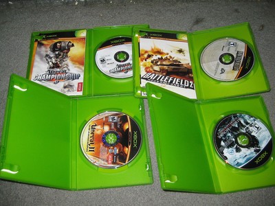 XBOX Video Game Lot of 4 games Ureal 2 Championship MOH European Battlefield 2