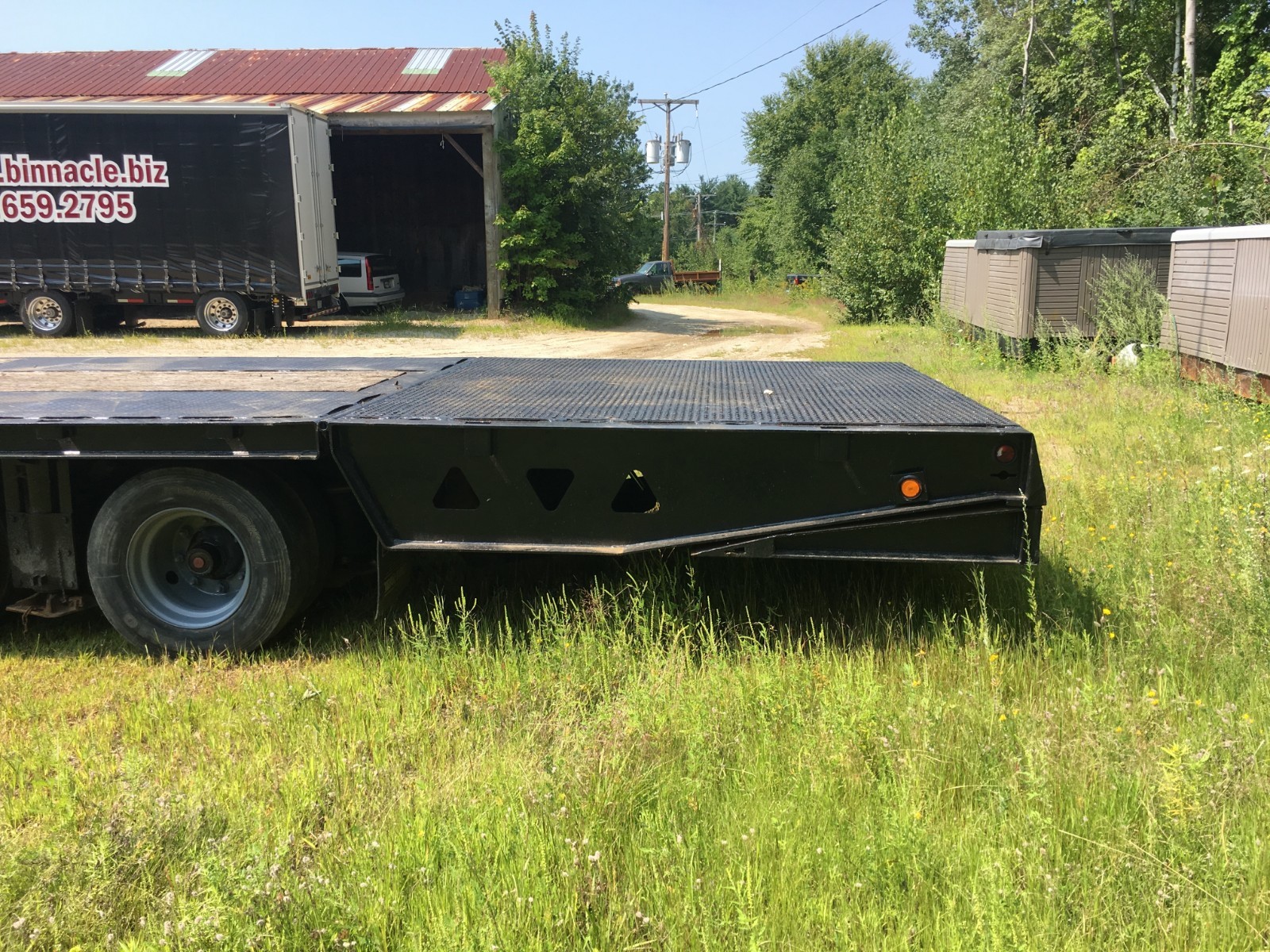 2003 TK70HT-482 Trailking Hydraulic Tail Trailer w/Braden Winch.