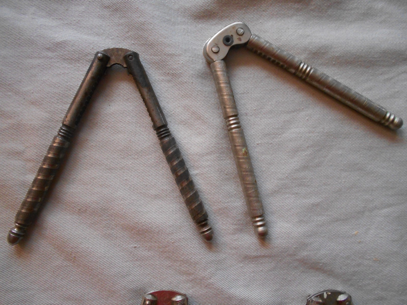 5 vintage steel HMQ nut crackers and 4 picks