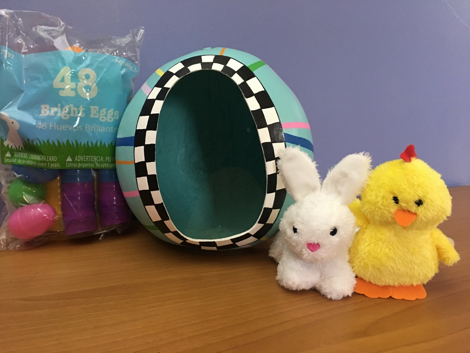 Easter painted gourd table decoration with eggs, bunny and chick