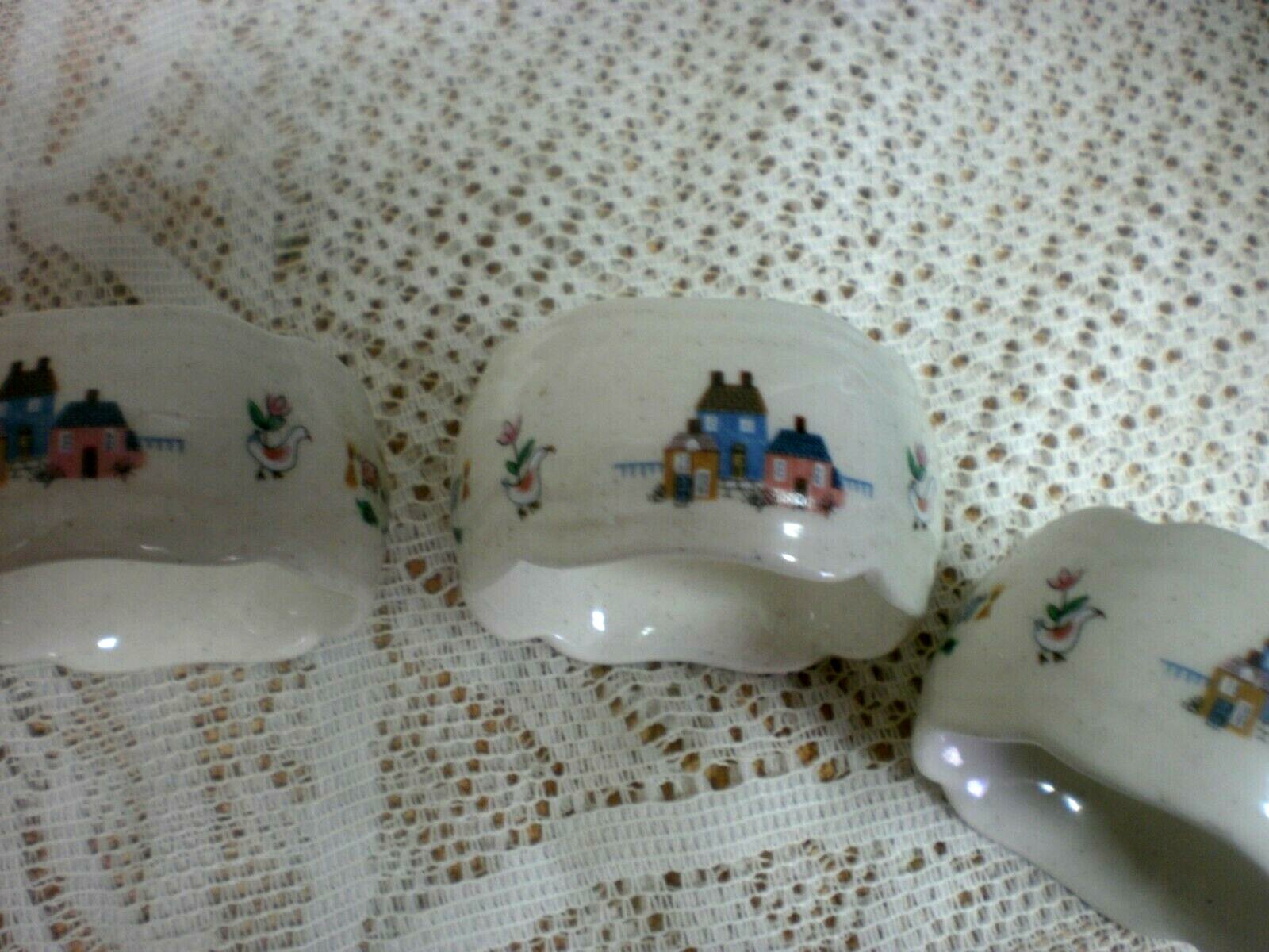 4 International China Heartland Embossed Stoneware Napkin Rings Colonial Houses