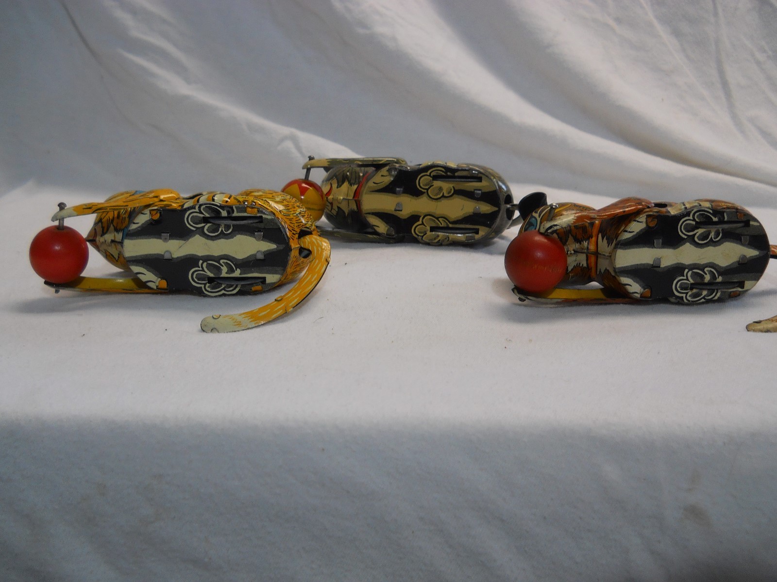 Three 1940's Marx Cat Rollover Wind-up Toys