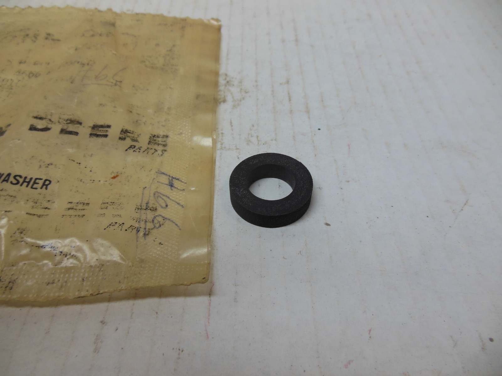 JOHN DEERE TRACTOR HOOD GRILLE TIN RUBBER WASHER SPACER A4666R