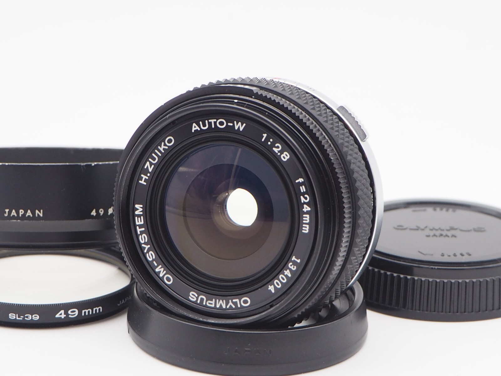 オリンパス OM-SYSTEM H.ZUIKO AUTO-W 24mm F2.8 NEAR MINT] Olympus OM System H.Zuiko Auto W 24mm f2.8 Lens