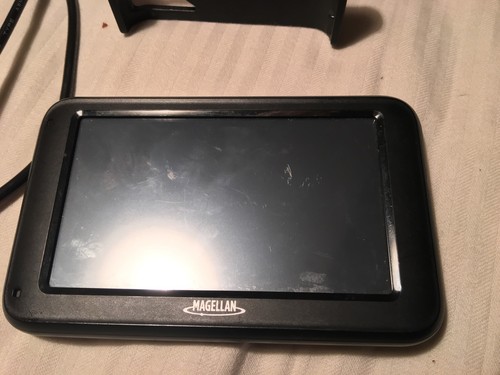 Magellan RM2230T-LM GPS Receiver With Car A/c Adapter And Dashboard Mount Bundle