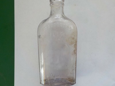 VINTAGE CLEAR GLASS BOTTLE WARRANTED FLASK W/CIRCLE INDET  8''H  (DB)