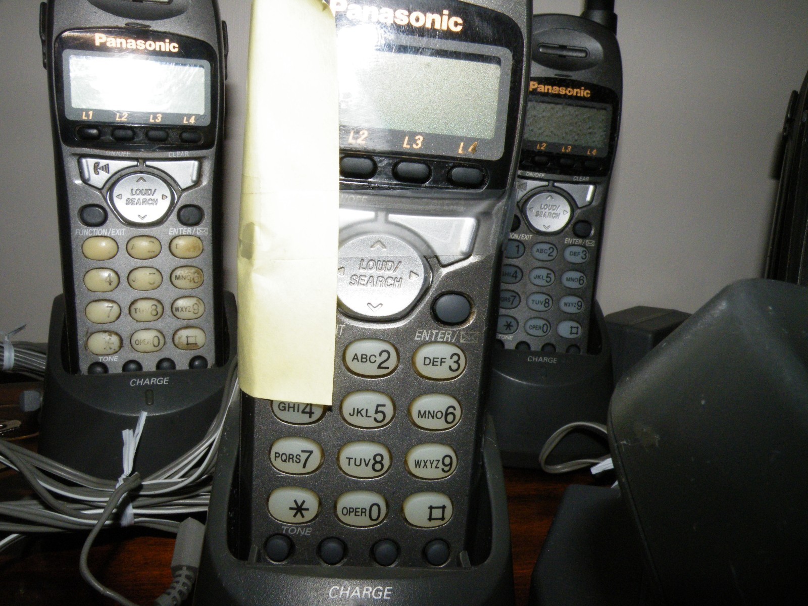 Panasonic Model KX-TG4000B Base and 7 Handsets with Chargers Read Below