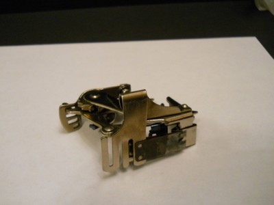 Singer sewing machine replacement part #1261 - adjustable ruffler (pre-owned)