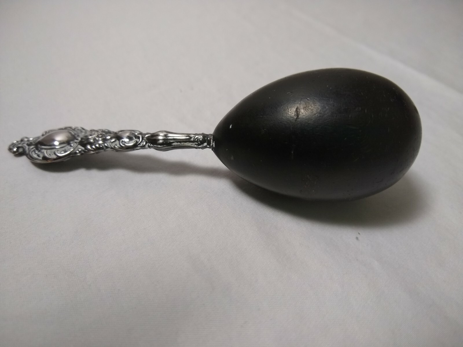 Antique Art Nouveau Sterling Silver Repousse Handle and Ebony Sock Darning Egg
