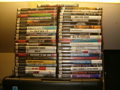 PS2 LOT 2 SLIM CONSOLES,4 CONTROLLERS,2 PWER AC ADAPTERS,2 AV CABLES,40 GAMES ++