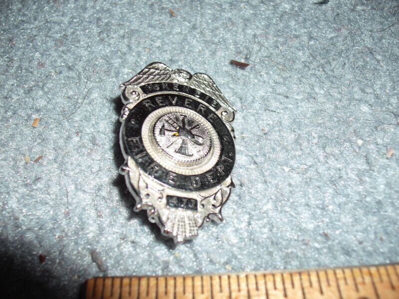 Vintage Fire Department Badge named and numbered Revere Massachusetts