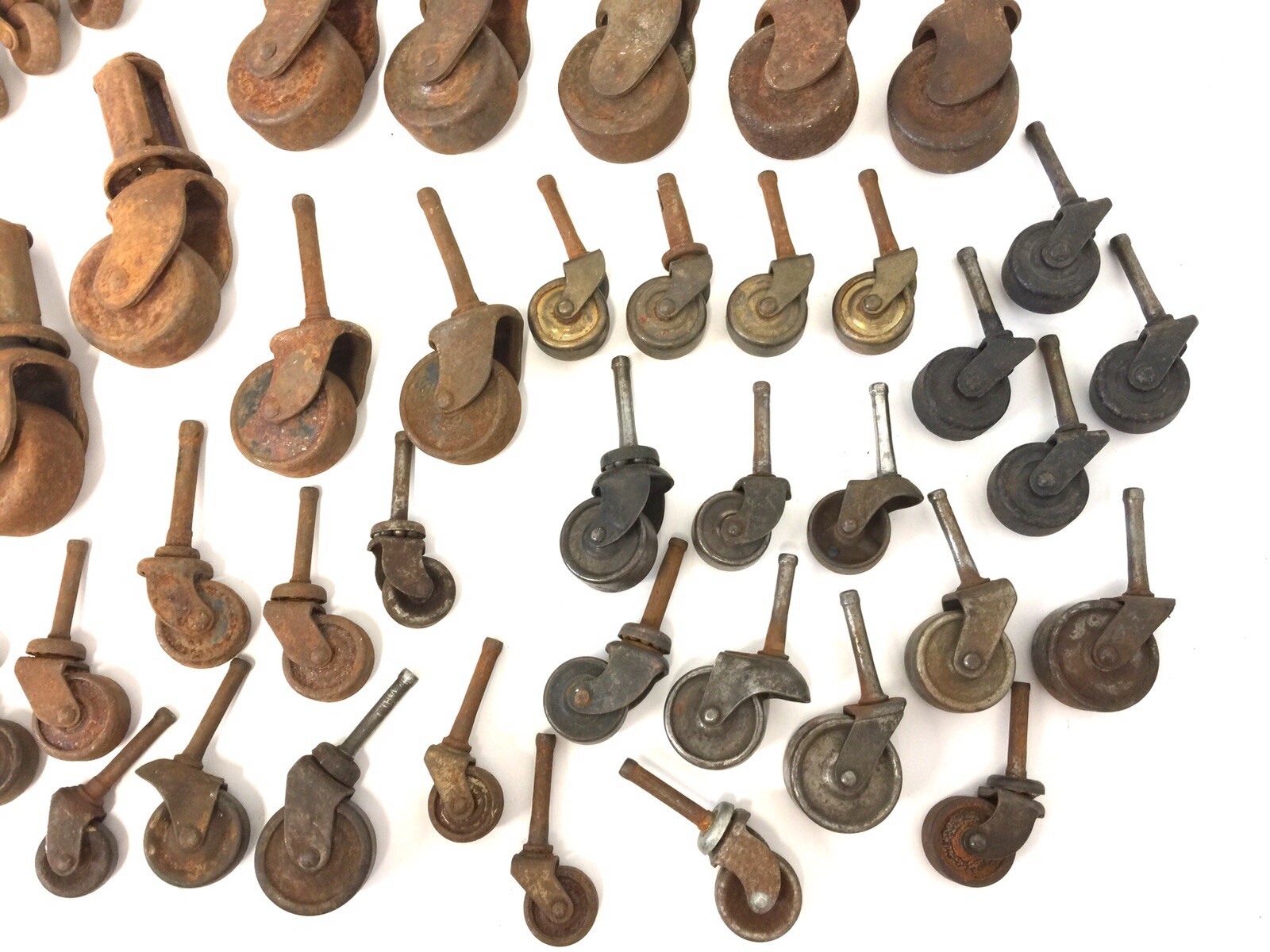 56 pc Lot Of Antique Furniture Casters Vtg Steel Brass Cast Iron Wheels Rolling