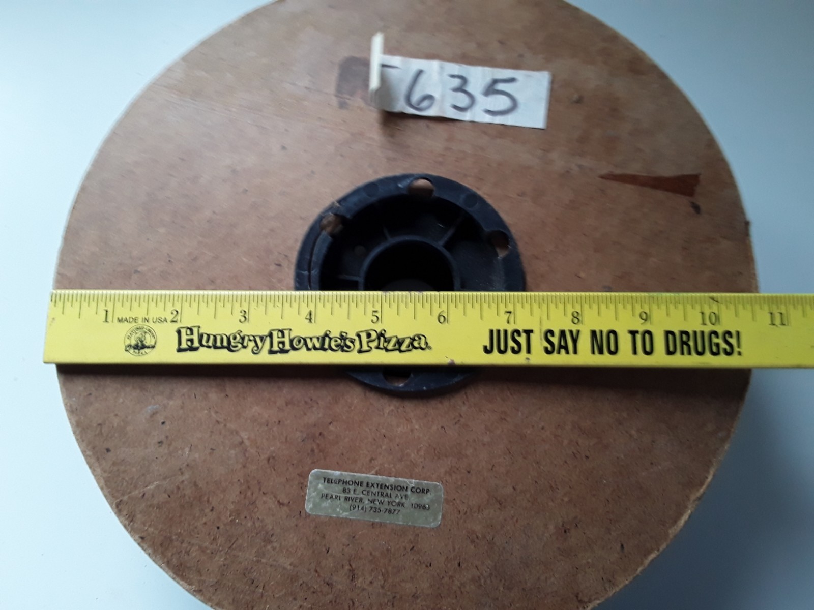 Spool of silver phone cord. Label says 500', but it is less than that.