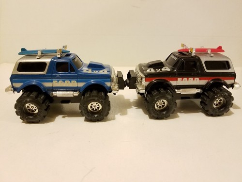 VINTAGE SCHAPER STOMPER 4X4 FORD BRONCO X 2 WITH BRONCO ON THE WINDSHIELD. RARE!