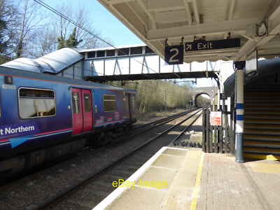 Photo 12x8 A train leaves Gordon Hill station Enfield The Alexandra Palace c2017