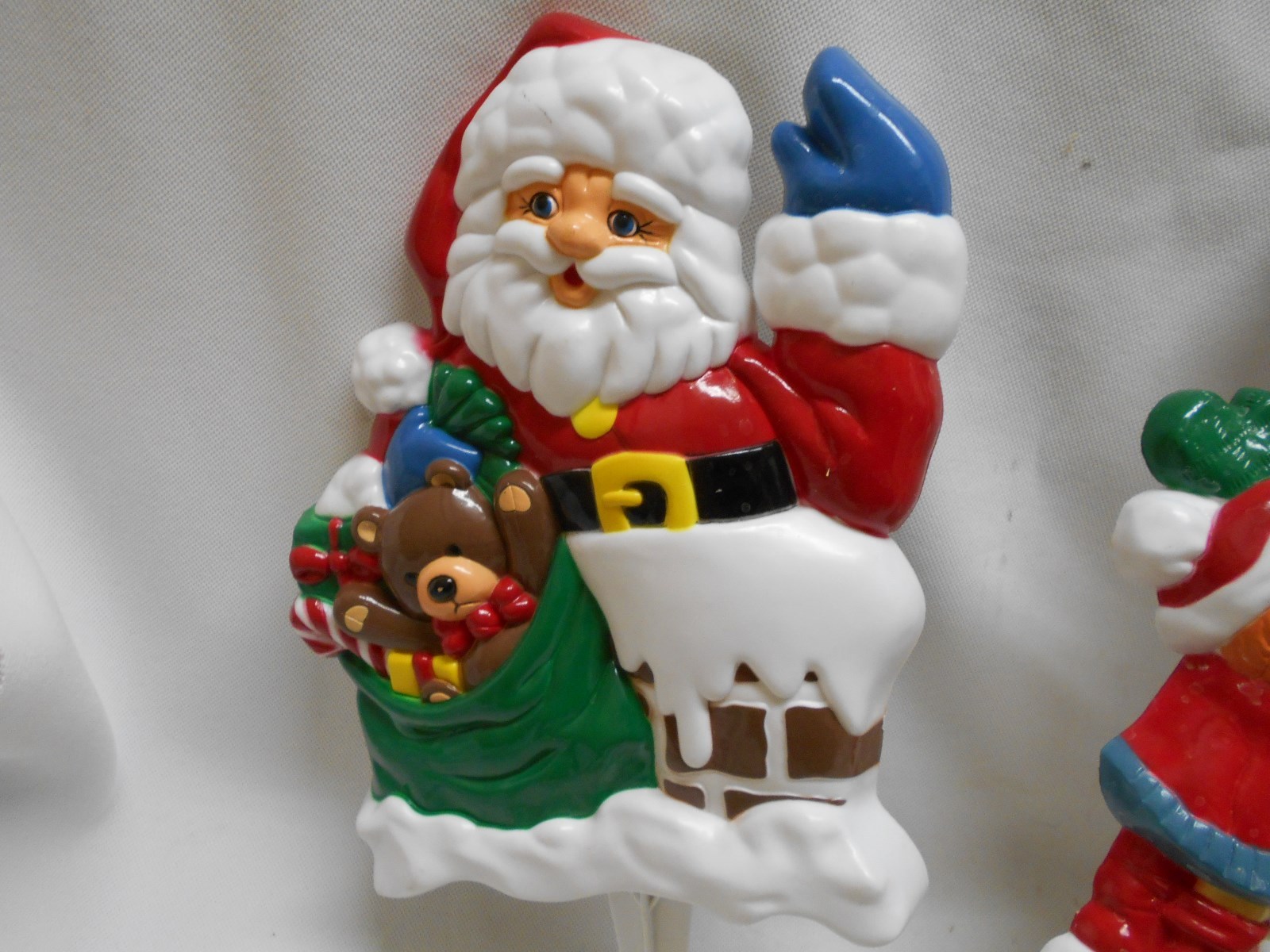 2 hard plastic outdoor stakes Christmas decorations Santa Claus waving snowman