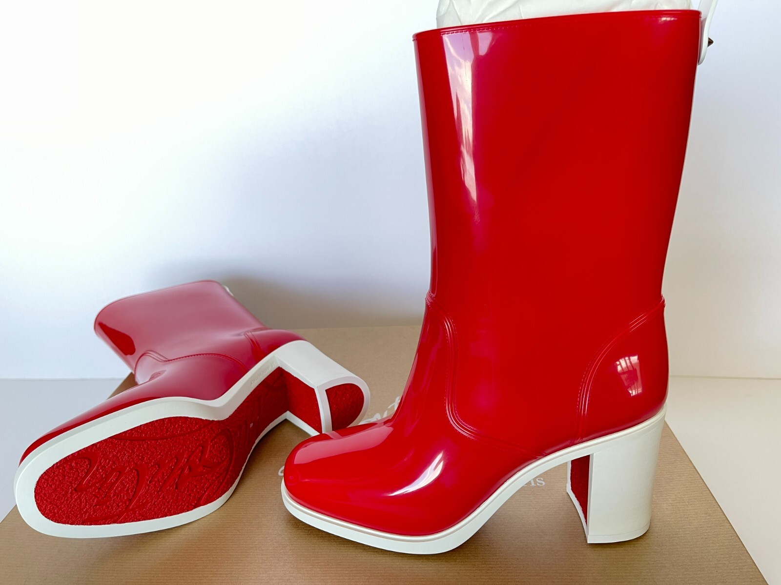 Christian Louboutin Loubirain Boots in waterproof PVC and