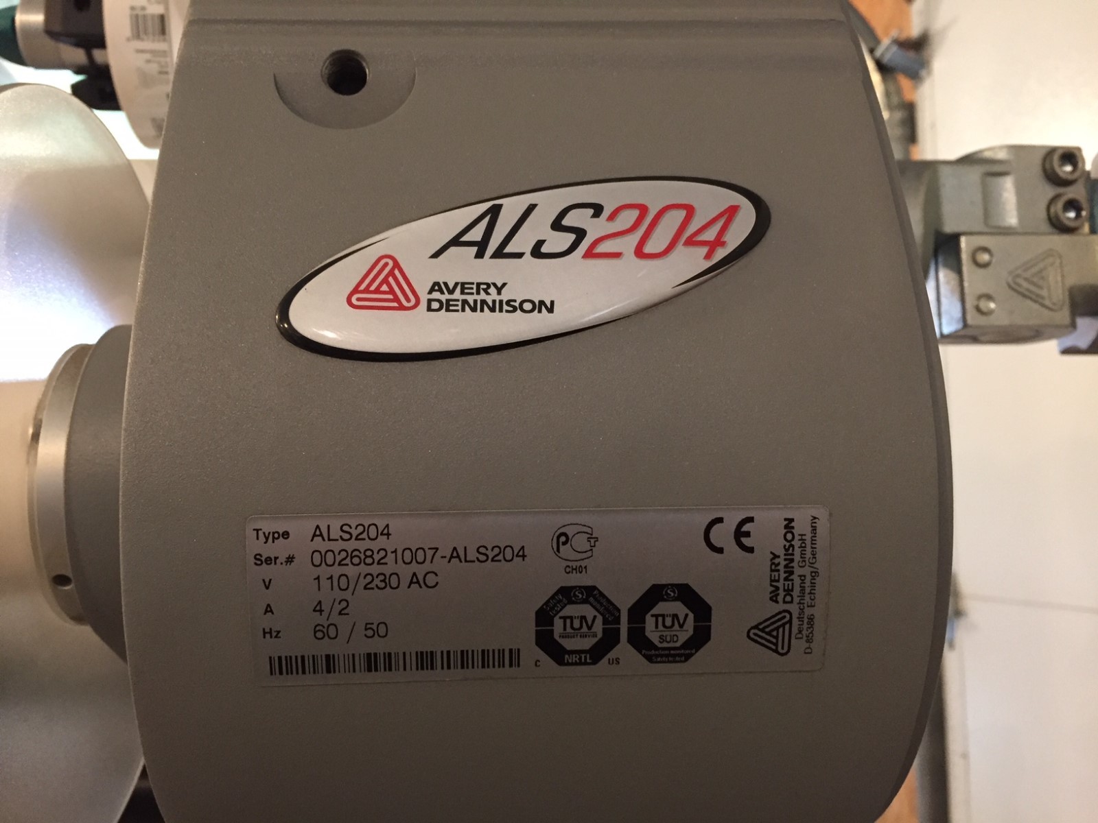 Avery Dennison ALS204 LH Merge-Apply Labeler with R.L. Craig Conveyor