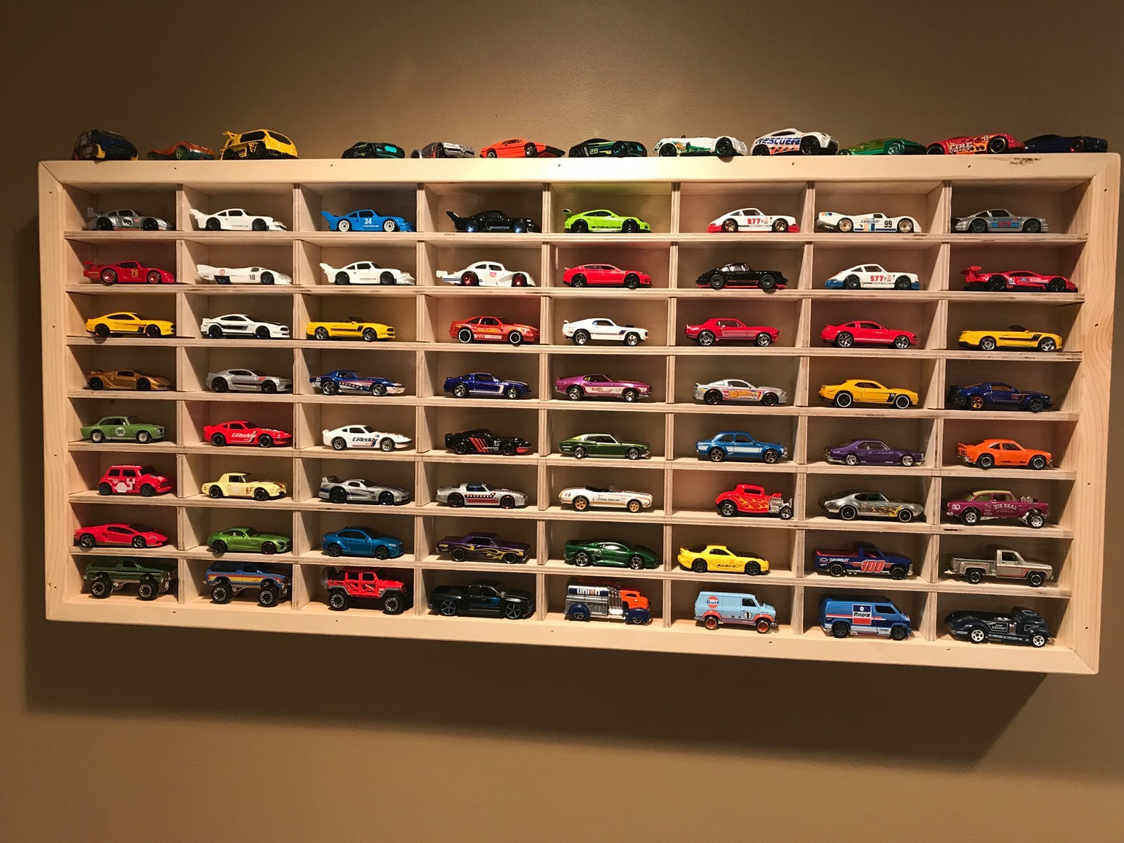 Hot wheels display case , custom made wood case that holds 64 cars