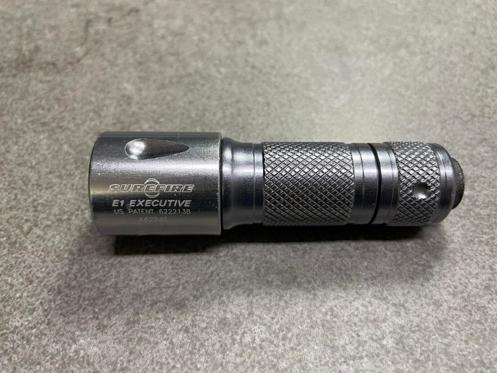 Surefire E1 Executive Tear Drop Gun Metal Color Flashlight Surefire E1 Executive Tear Drop Gun Metal Color Flashlight