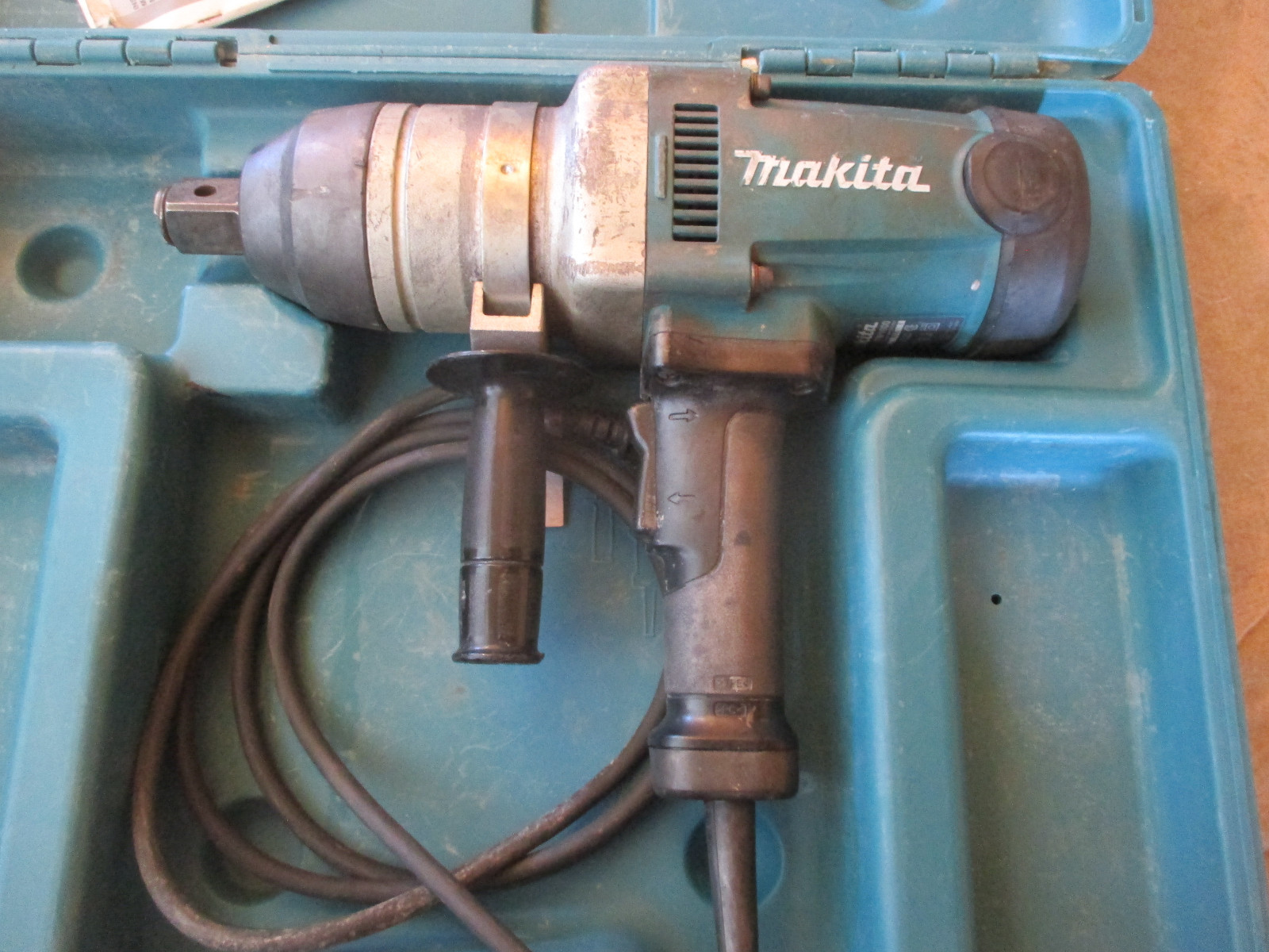 Makita TW1000 Corded Impact Wrench With Case. 1