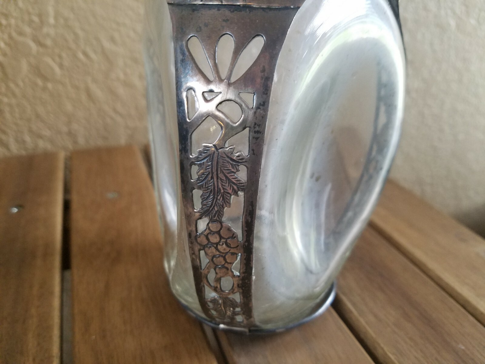 Sterling silver overlay on collectible Hague pinch side decanter