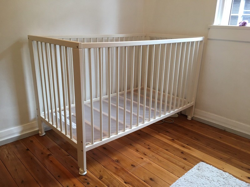 cot bed including mattress