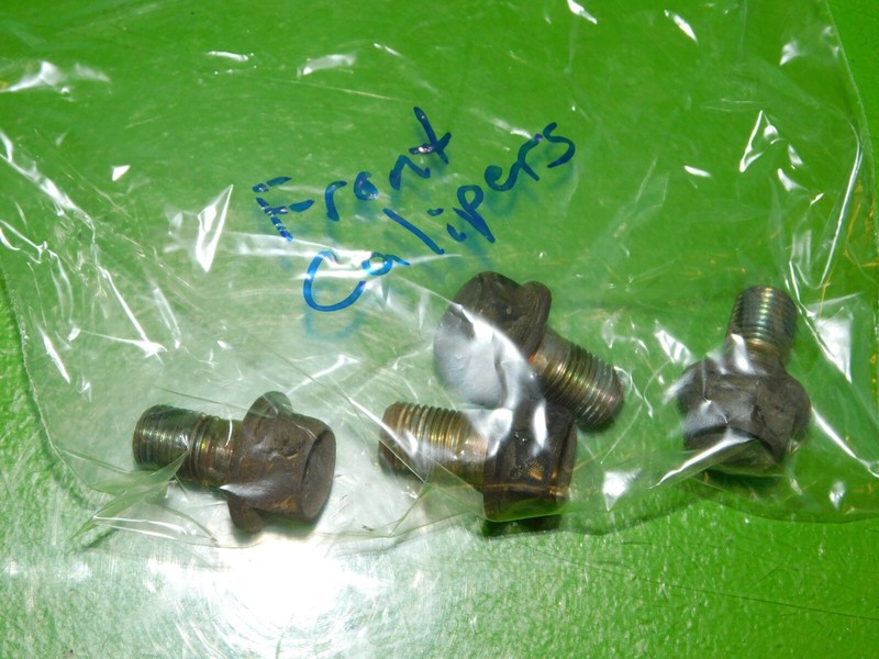 04-08 TSX OEM front brake caliper mount bolts SET