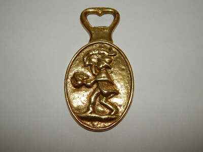 Vintage Brass Bottle Opener Irish Man Bell and Horn The Word Eire Written Above