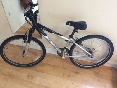 giant rock mountain bike XS blue and grey, 26" wheels.