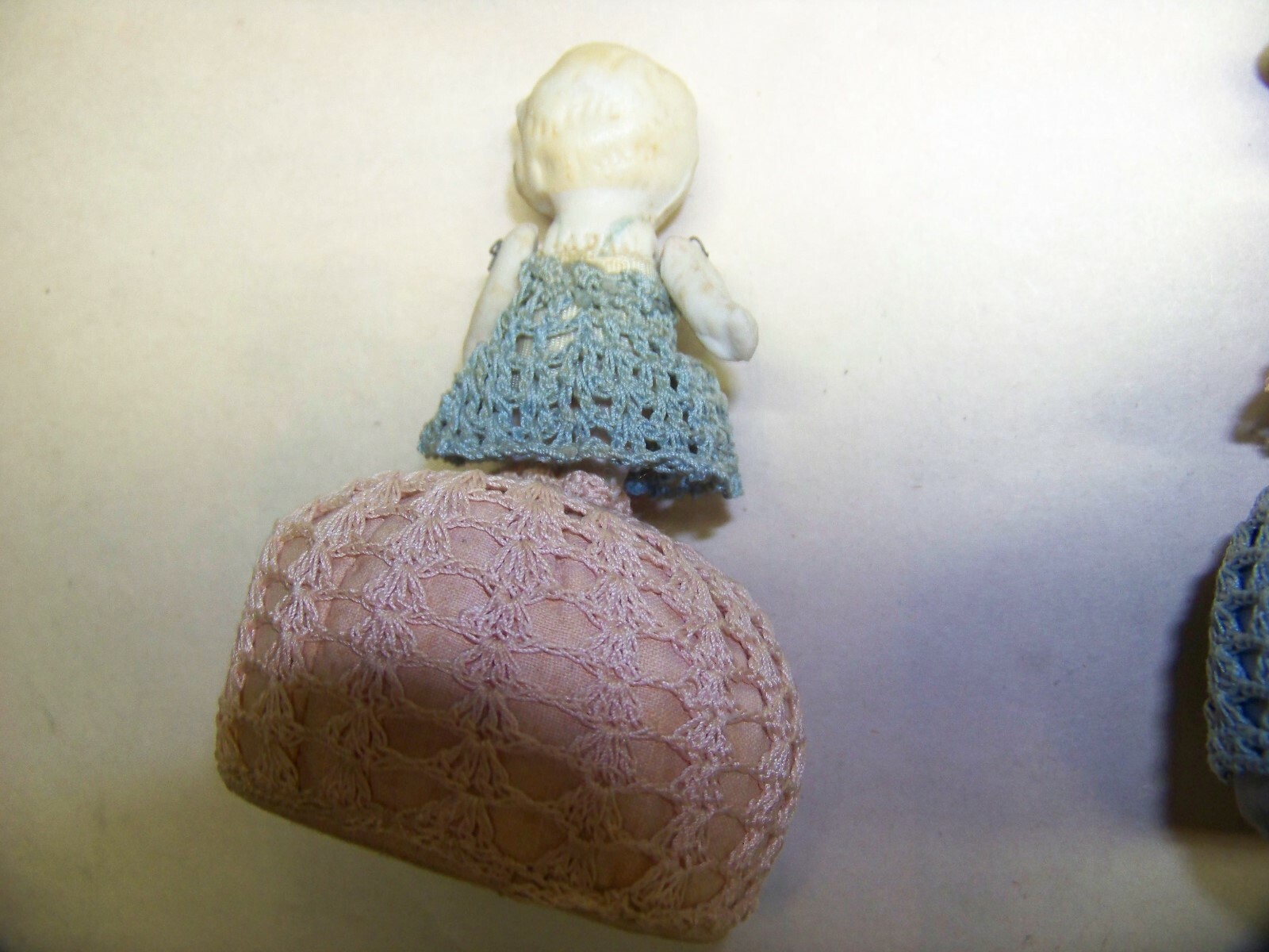 Pair of vintage doll pin cushions