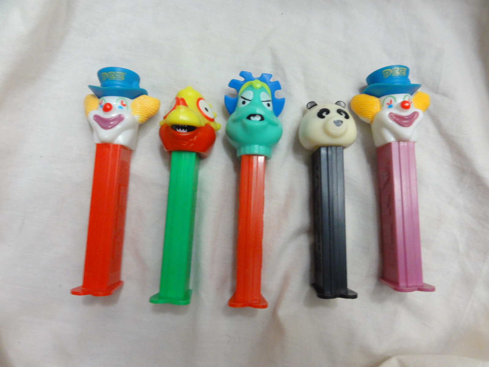 Pez Lot 5 Panda, SHE-SAUR, I-Saur, Peter PEZ Clown Issue B Purple/Red Stem