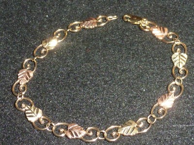 10K SOLID YELLOW & ROSE GOLD SCROLL-WORK VINE BRACELET - 7 5/8