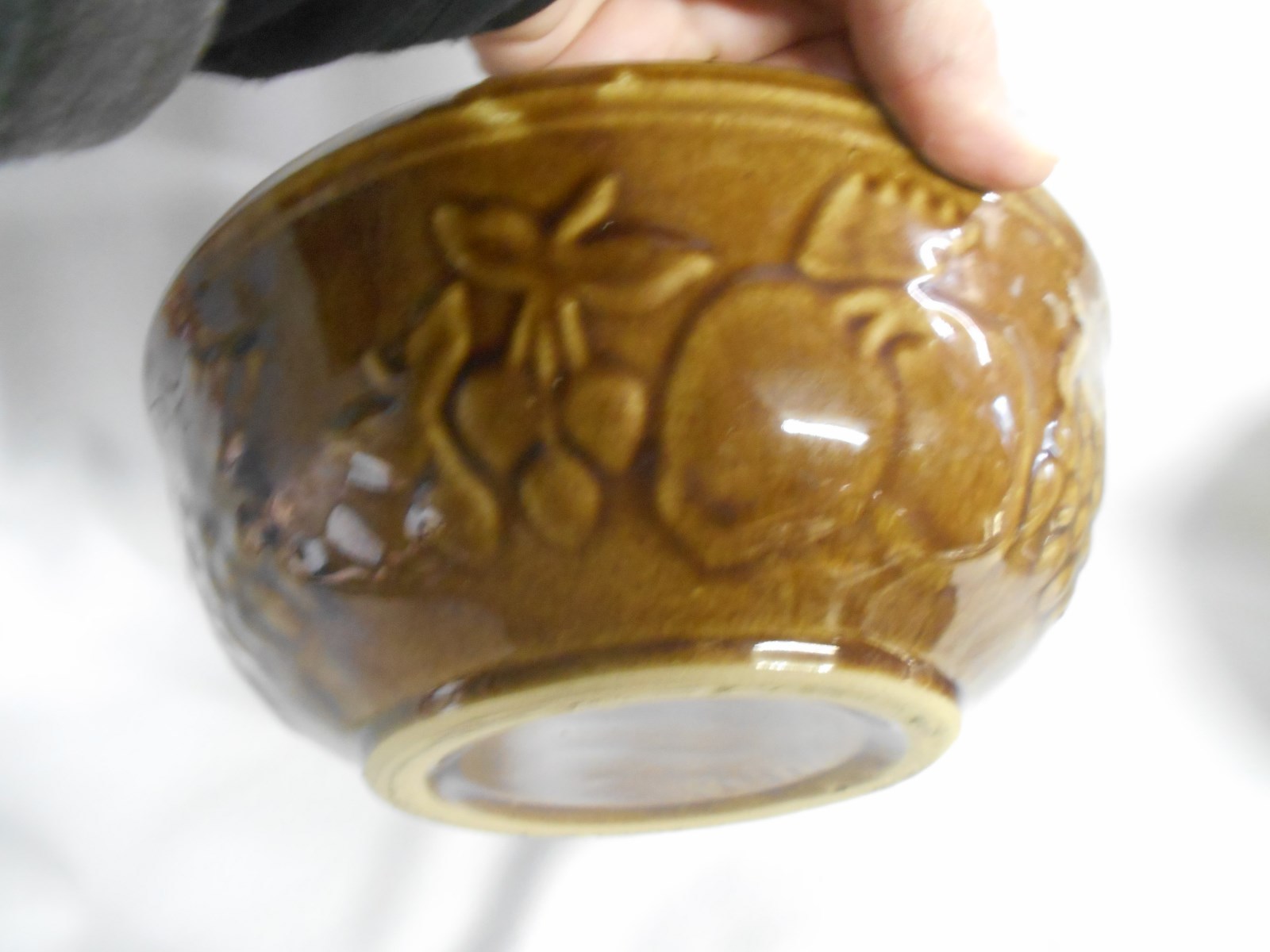 vintage USA brown crock / stoneware  bowl with embossed fruit design