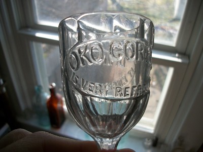 FANCY PANELED STEM DRINKING GLASS OKO CORDIAL REFRESHING IT ENRICHES THE BLOOD
