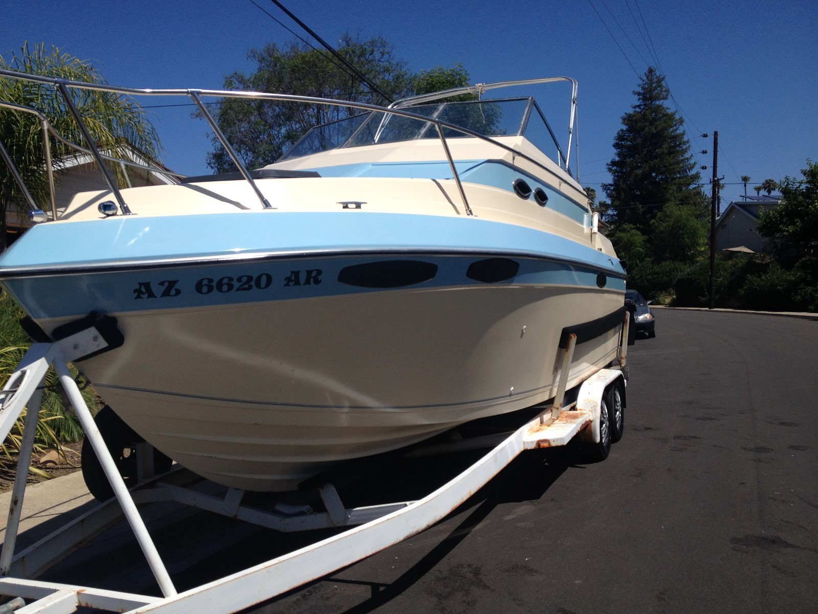 Cuddy Cabin 25' overnighter w/26' dual wheel trailer 268 Original eng hours!