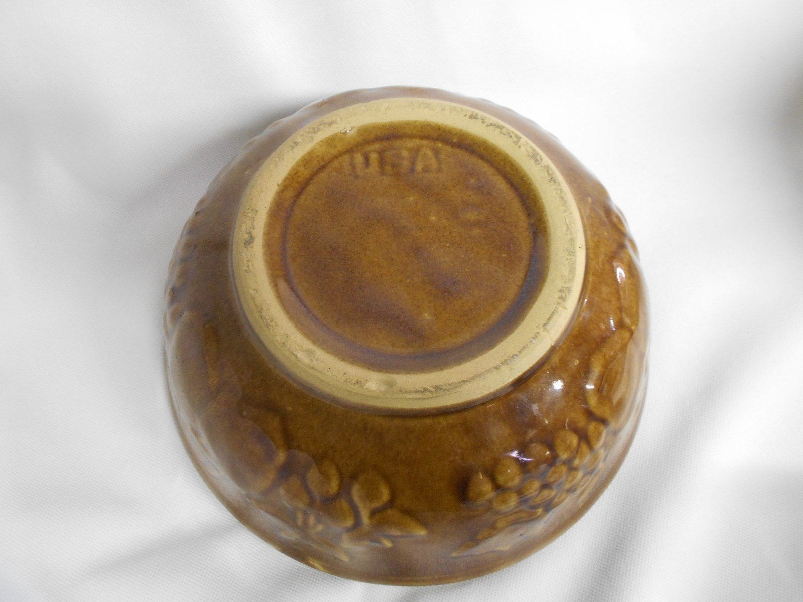 vintage USA brown crock / stoneware  bowl with embossed fruit design