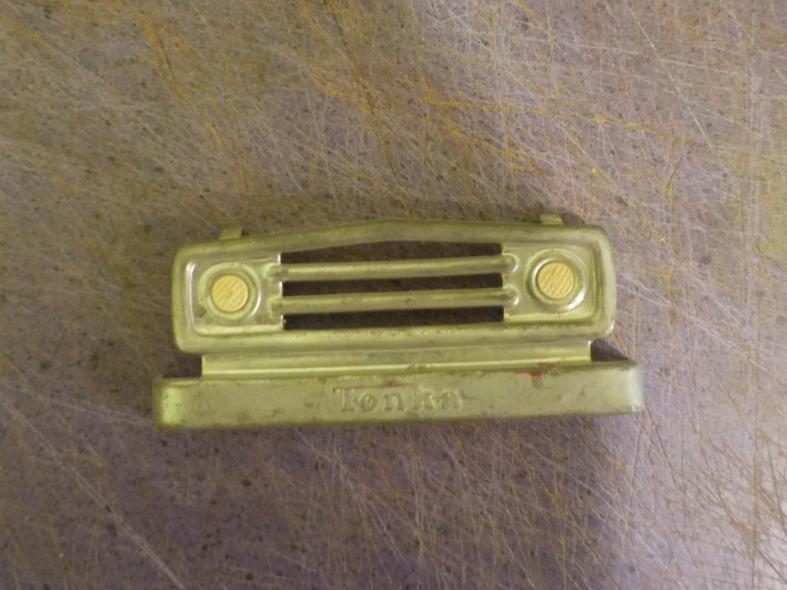 tonka dodge truck grill and 2 white headlight for parts