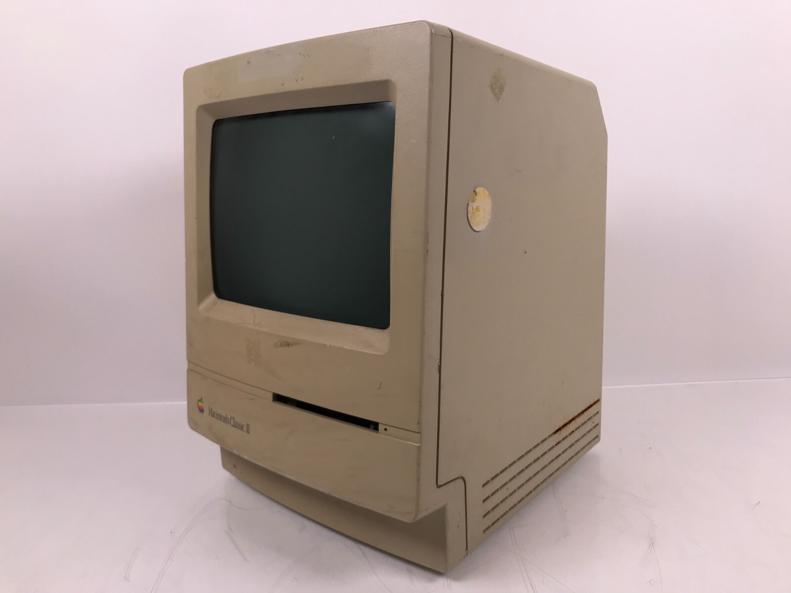 A MACINTOSH CLASSIC II SIGNED BY JOBS AND WOZ, APPLE COMPUTER INC