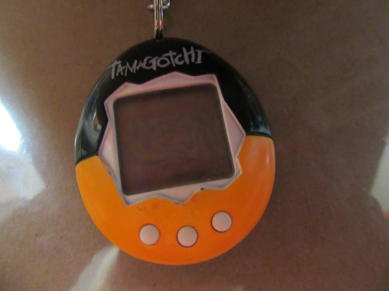 Original Tamagotchi 1997 (Black & Orange)  Key Chain untested
