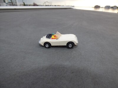 AURORA  VIBRATOR  TJET AFX 1541 WHITE JAGUAR  XK140 CONVERTIBLE HO SLOT CAR