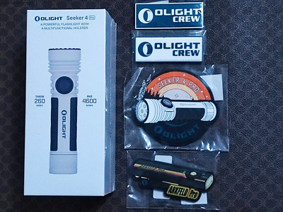 Olight Seeker 4 Pro weiß + 4 Patches NEU in OVP