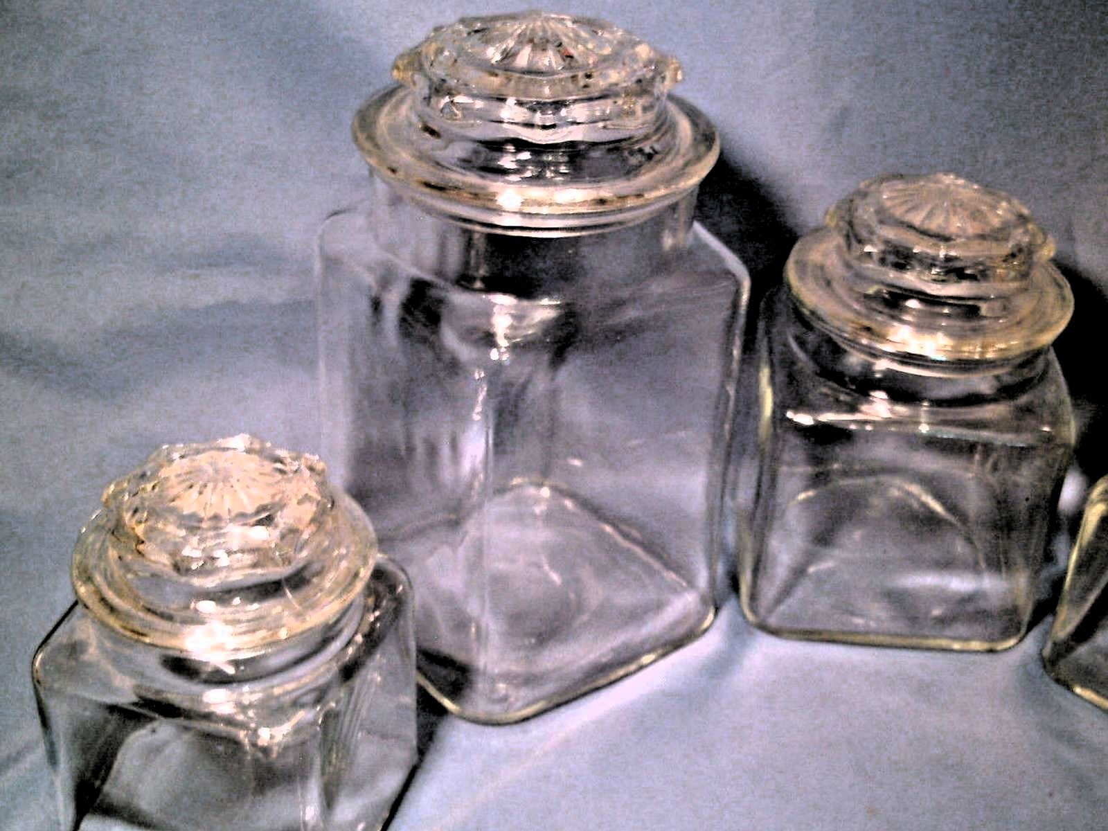 VINTAGE Set Of 4 Clear Glass Candy Store Cookie Jars w/ Decorated Covers 9.5